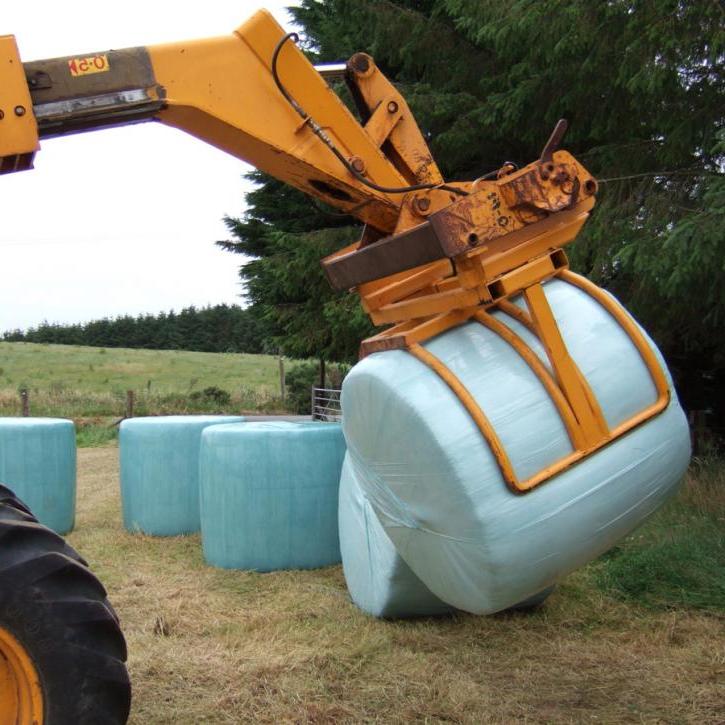 Wrapped Bale Clamp for handing wrapped silage bales.